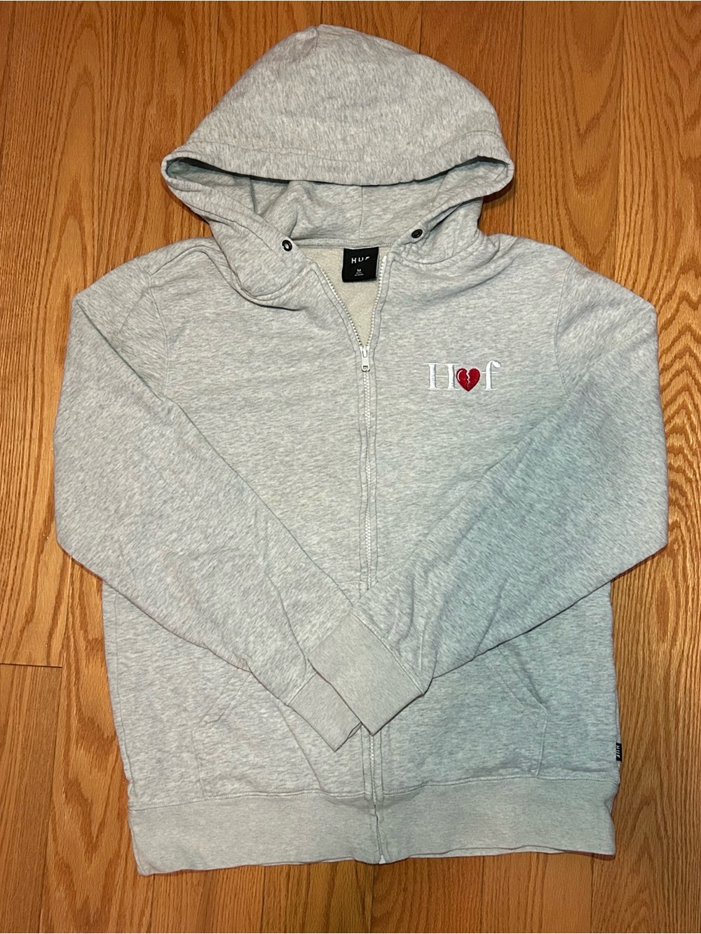 HUF Men’s Light Gray Zip-Up Hoodie with Red Heart Patch